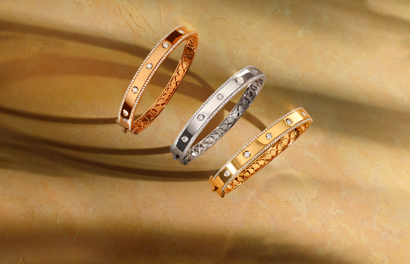  A trio of Le Vian® bangles each set with 1.2 carats of Nude Diamonds™ set in 14K Strawberry Gold®