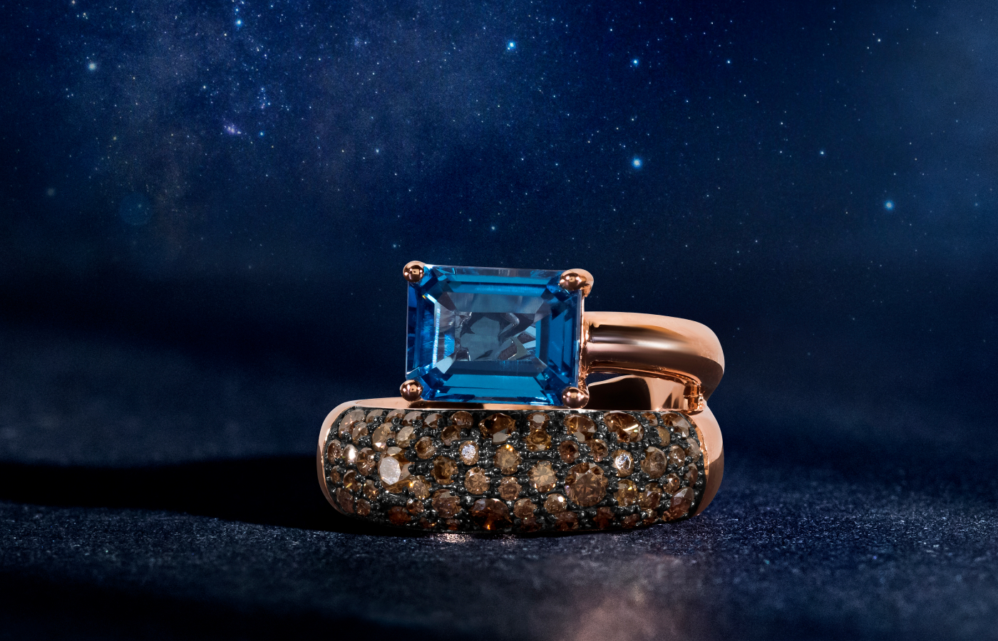  Le Vian Chocolatier® ring with a 2.5 carat Deep Sea Blue Topaz™ and Chocolate Diamonds® set in 14K Strawberry Gold®