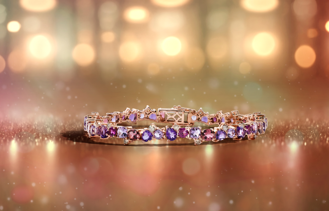  Le Vian® bracelet with 3.3 carats of amethyst, 2.3 carats of Passion Fruit Tourmaline™, 1.5 carats of Raspberry Rhodolite®, and Nude Diamonds™ set in 14K Strawberry Gold®