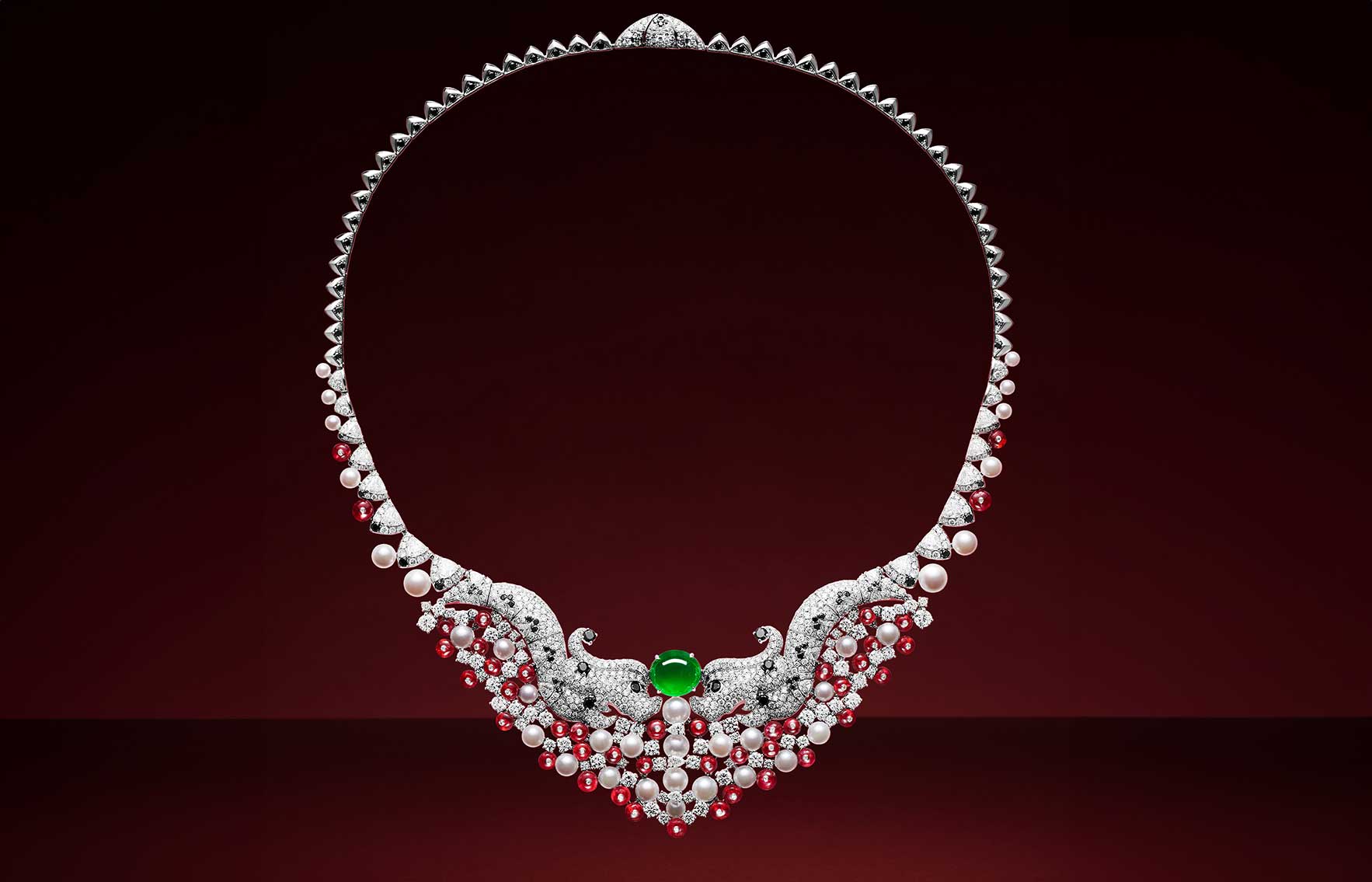  HEHE High Jewelry Dragon Harmony Dual Dragon Fetching Water necklace from the Ascending Dragon High Jewellery collection with red spinel beads, a green jadeite cabochon, pearls, and diamonds 