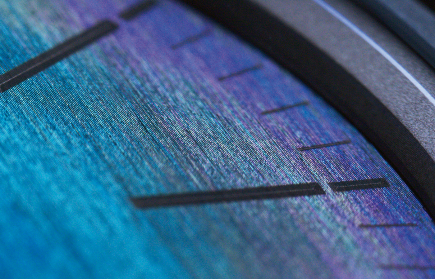  Close up of the Oris ProPilot X Calibre 400 Laser watch light-reflecting lasered titanium dial