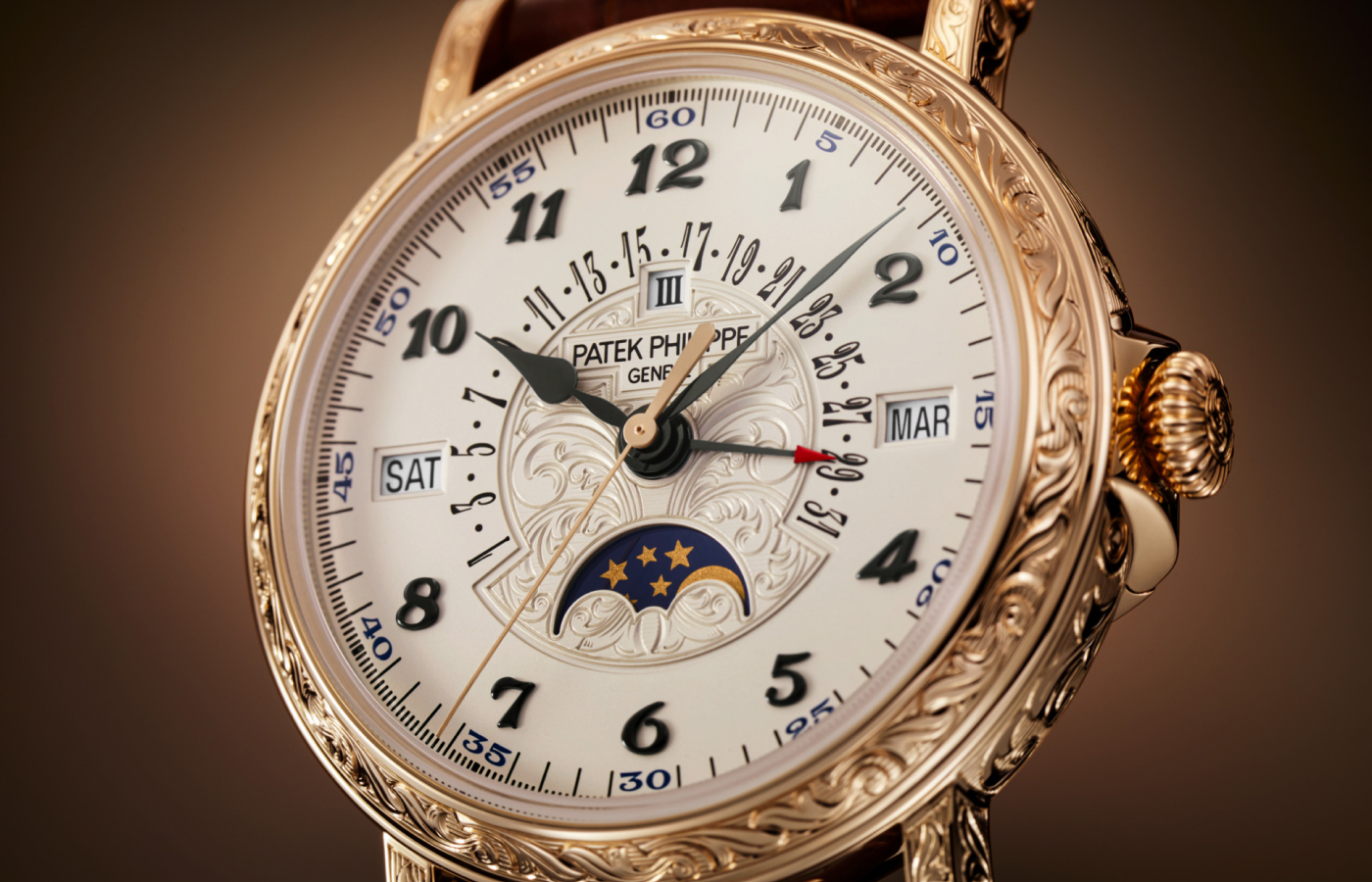 Patek Philippe Retrograde Perpetual Calendar Rare Handcrafts watch with a silvery opaline dial, hand-engraved centre and blackened white gold applied Breguet numerals in rose gold