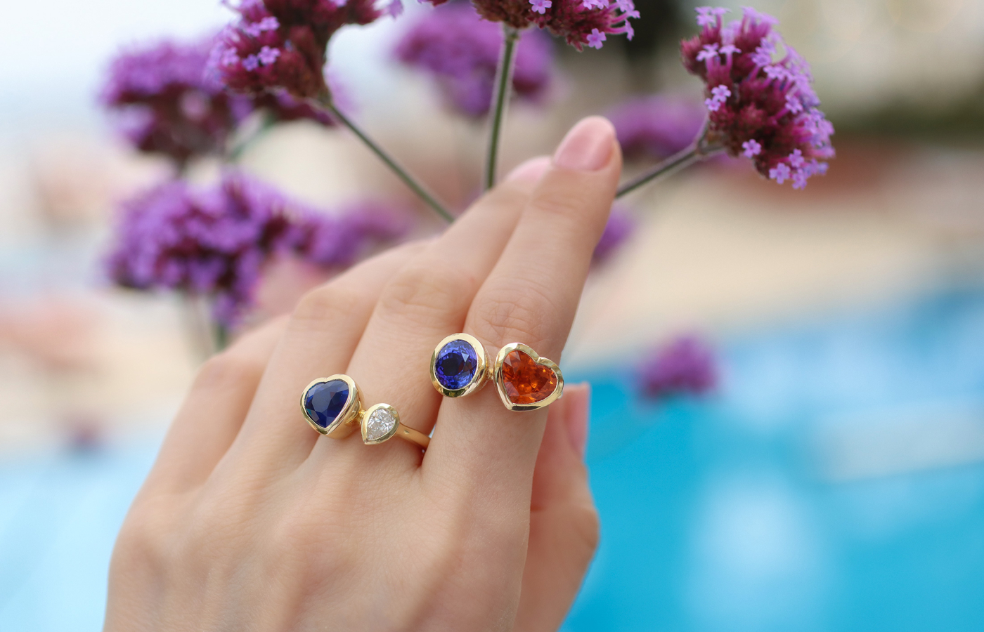  Katerina Perez wears rings from the Florence Carr Duo collection, including the Heart ‘Toi et Moi’ ring with a 5.04 carat mandarin garnet and a 3.75 carat tanzanite, alongside a ‘Toi et Moi’ ring with a 4.73 carat royal blue sapphire and a 0.5 carat pear-shaped diamond, both in 18k yellow gold