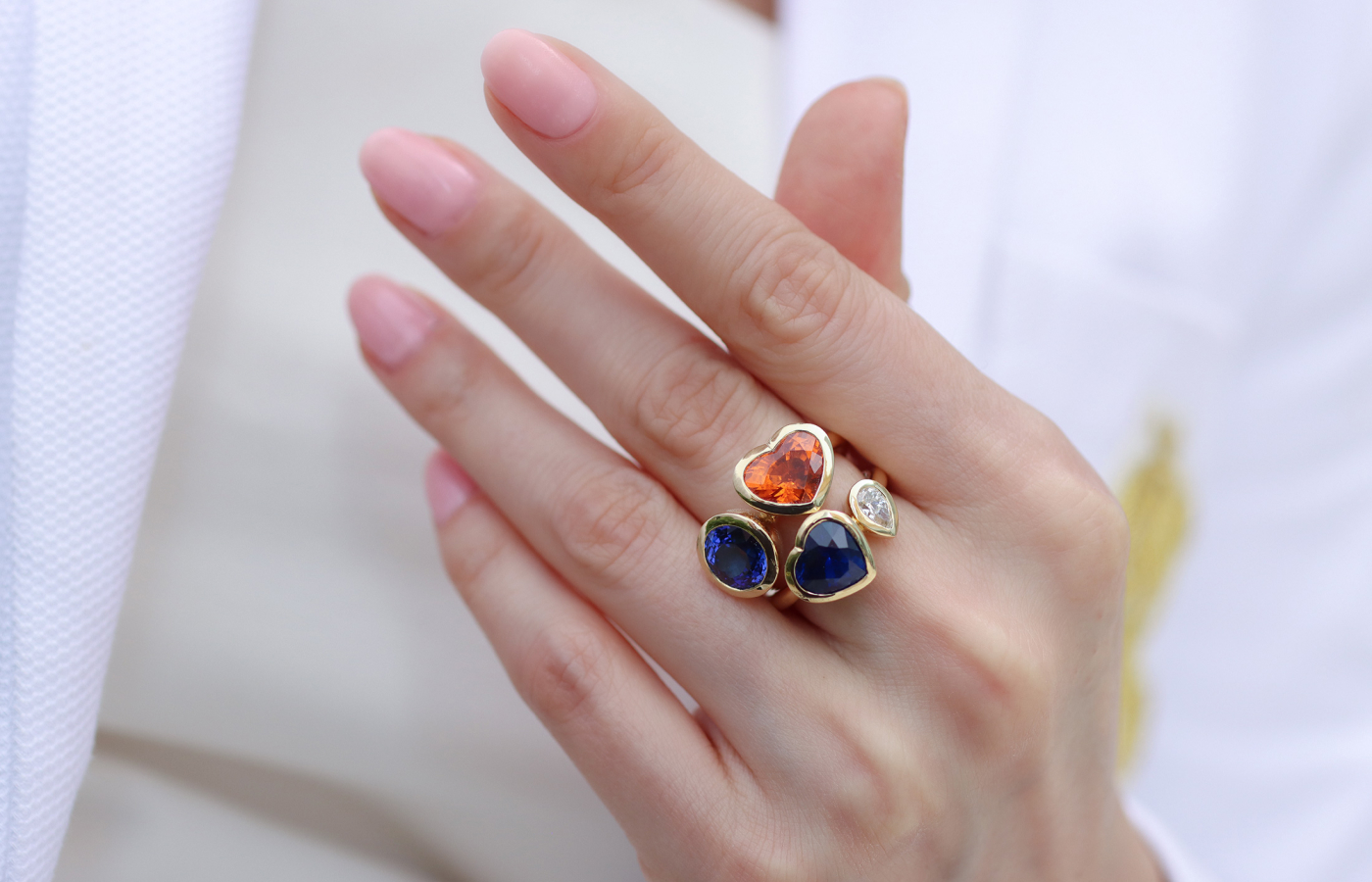  Katerina Perez wears rings from the Florence Carr Duo collection, including the Heart ‘Toi et Moi’ ring with a 5.04 carat mandarin garnet and a 3.75 carat tanzanite, alongside a ‘Toi et Moi’ ring with a 4.73 carat royal blue sapphire and a 0.5 carat pear-shaped diamond, both in 18k yellow gold