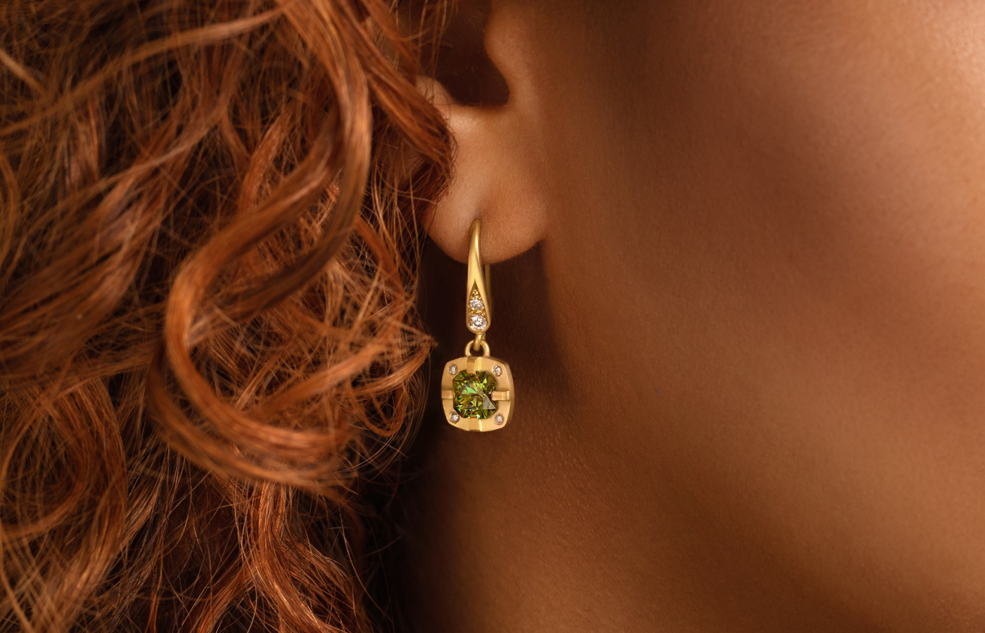 Florence Carr drop earrings from the Tafari collection with 3.12 carats of demantoid garnet and diamond accents, set in 18k yellow gold 