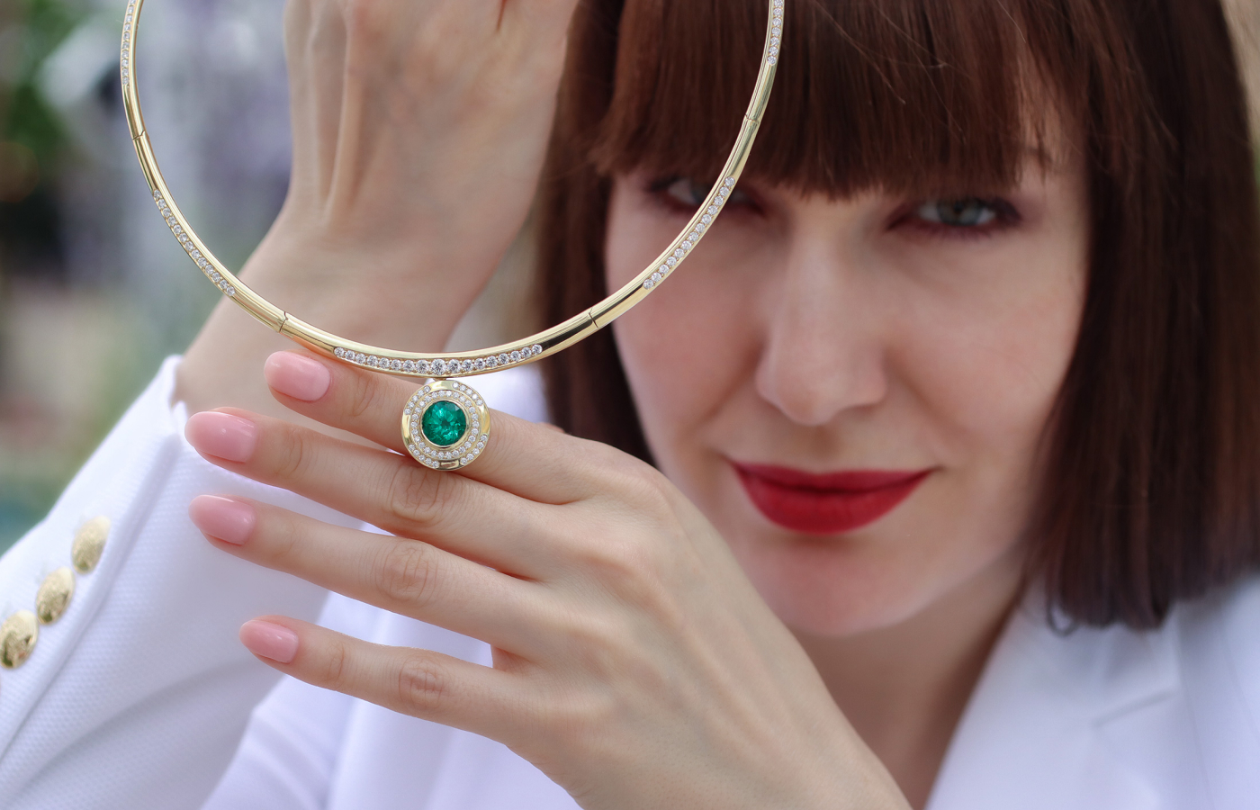  Florence Carr semi-flexible hinged torque necklace with 3.03 carats of diamonds in 18k yellow gold with the detachable Maze pendant featuring a 4.2 carat emerald and diamond pavé, also in 18k yellow gold