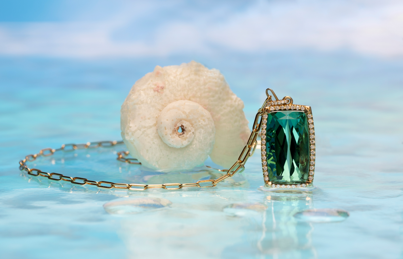  Lisa Nik necklace from the Colors collection with a 15.26 carat blue green indicolite tourmaline and diamond pendant, set on a Golden Dreams paperclip chain, all in 18k yellow gold 