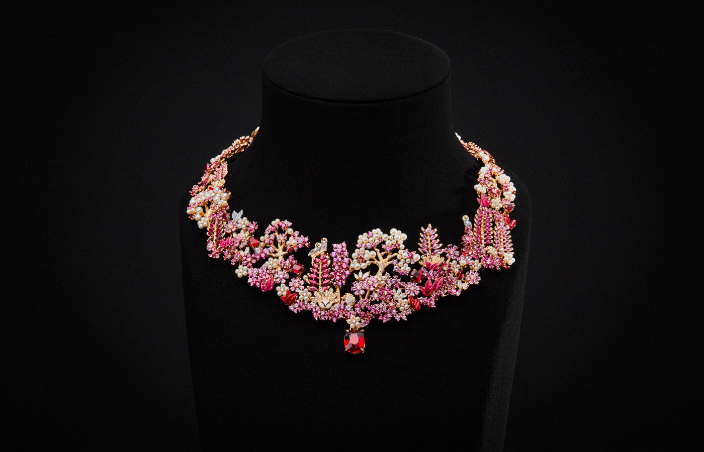 Dior Joaillerie high jewellery necklace from the Diorama & Diorigami collection with a 7.02 - carat ruby, red and pink rubies, pink sapphires, cultured pearls, diamonds and lacquer in pink gold