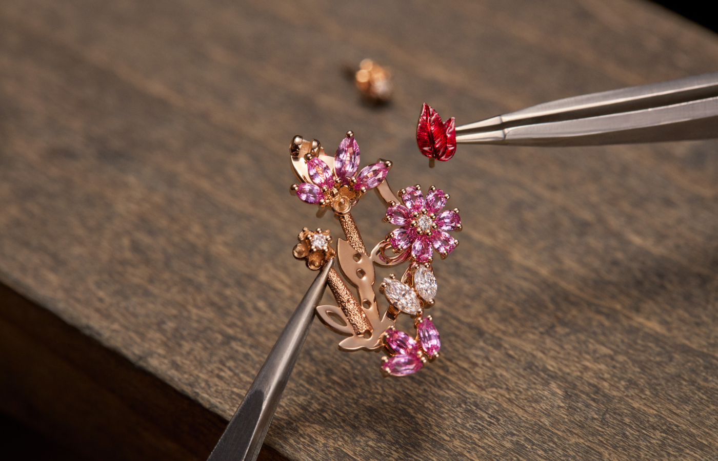  Making of the Dior Joaillerie high jewellery earrings from the Diorama & Diorigami collection with 2 central rubies weighing 3.33 and 3.06 - carats, red and pink rubies, pink sapphires, cultured pearls, diamonds and lacquer in pink gold