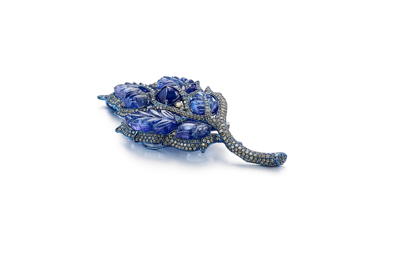  Gilin ‘Royal Flame’ brooch with a 6-carat sugarloaf sapphire, 46.56 carats of carved tanzanites, and 434 brilliant-cut diamonds totalling 5.47 carats, set in 18k gold 
