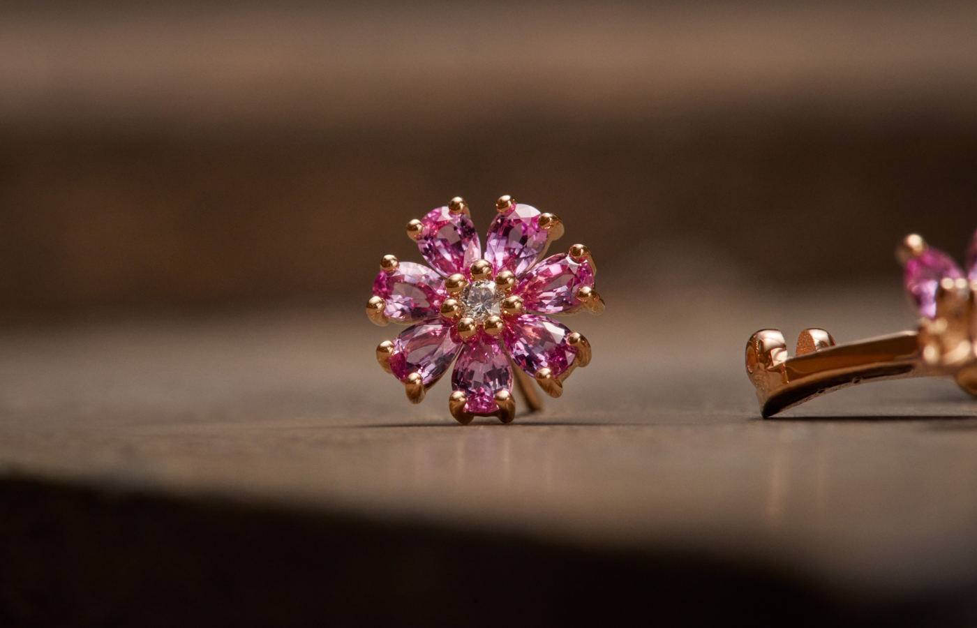  Pear-shaped pink sapphires appear in a Dior Joaillerie necklace set with rubies, sapphires, cultured pearls, diamonds and lacquer in the Diorama & Diorigami High Jewellery collection