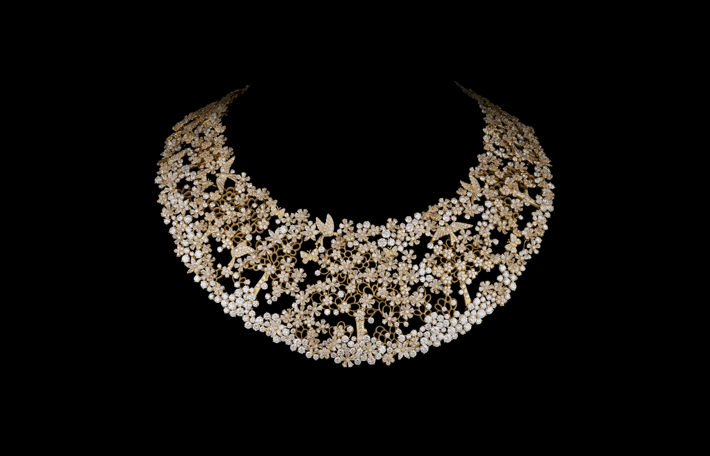  Dior Joaillerie Diorama Résille Dorée necklace with a layer of openwork gold, diamond-set flowers, miniature birds and golden tree branches, part of the Diorama & Diorigami High Jewellery collection