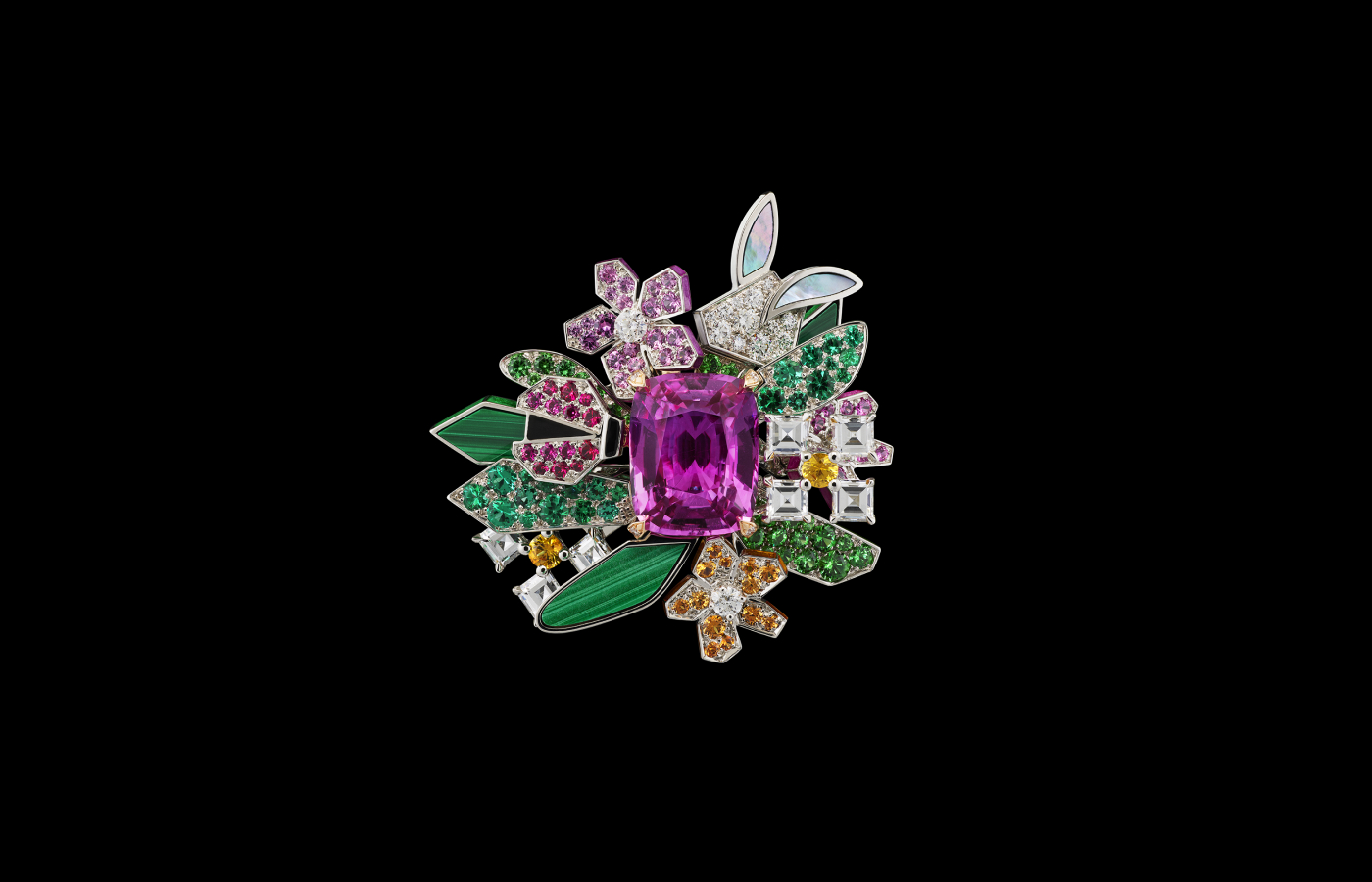  The first suite from the Diorigami chapter of the Diorama & Diorigami High Jewellery collection includes this ring with malachite, mother of pearl, rubies, sapphires, emeralds and tsavorite garnets, surrounding a large pink sapphire 