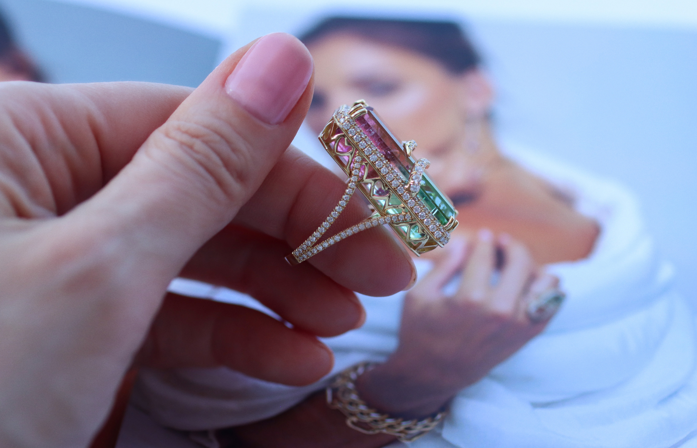  A side view of a Colors collection cocktail ring by Lisa Nik, set with an emerald-cut watermelon tourmaline of 30.27 carats and 1.6 carats of diamonds in 18k yellow gold 