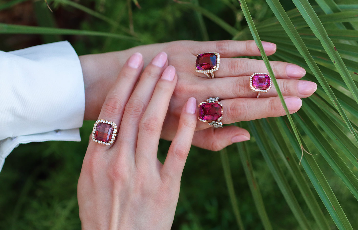 Katerina Perez wears rings by Lisa Nik, including (left hand) a 17.85 carat rubellite Flower ring (index), a 9.76 carat Asscher-cut rubellite ring (middle), a 15.87 carat rubellite ring (ring finger), and (right hand) a 10.20 carat bi-colour pink-purple tourmaline and diamond ring, all in 18k rose and white gold