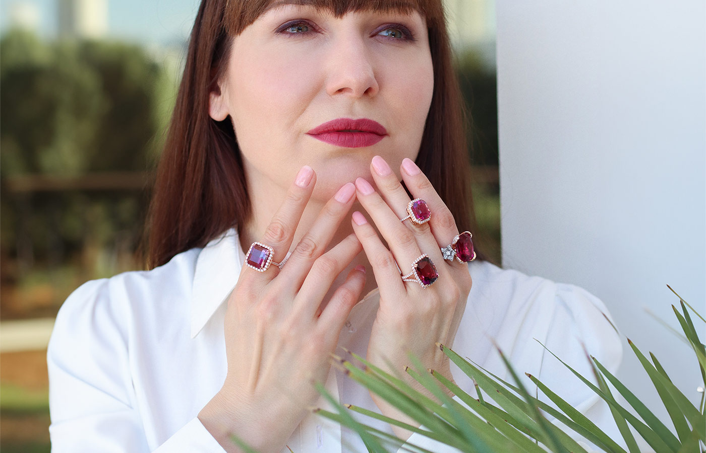  Katerina Perez wears rings by Lisa Nik, including (left hand) a 17.85 carat rubellite Flower ring (index), a 9.76 carat Asscher-cut rubellite ring (middle), a 15.87 carat rubellite ring (ring finger), and (right hand) a 10.20 carat bi-colour pink-purple tourmaline and diamond ring, all in 18k rose and white gold