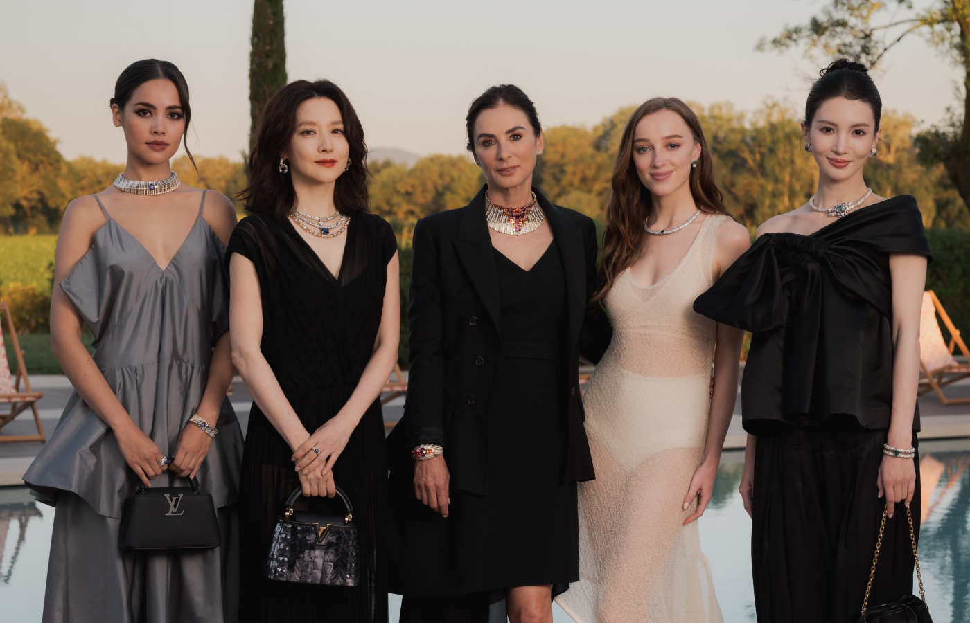 Urassaya Sperbund, Young-ae Lee, Francesca Amfitheatrof and Phoebe Dynevor wearing pieces from the Louis Vuitton Awakened Hands, Awakened Minds high jewellery collection