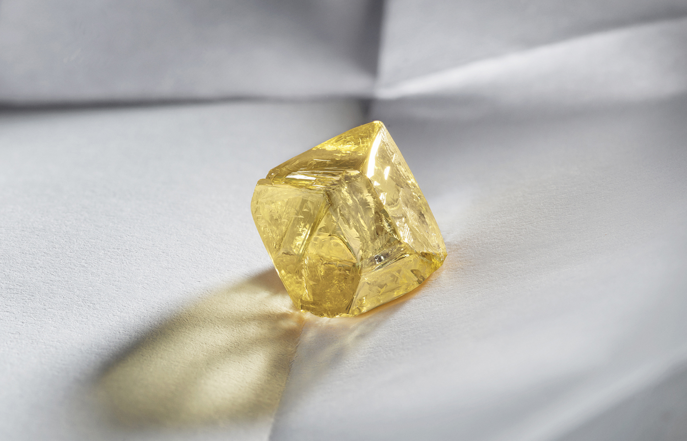  Rough octogonal step-cut yellow sapphire set at the heart of the the Louis Vuitton Vision necklace rom the Awakened Hands, Awakened Minds collection