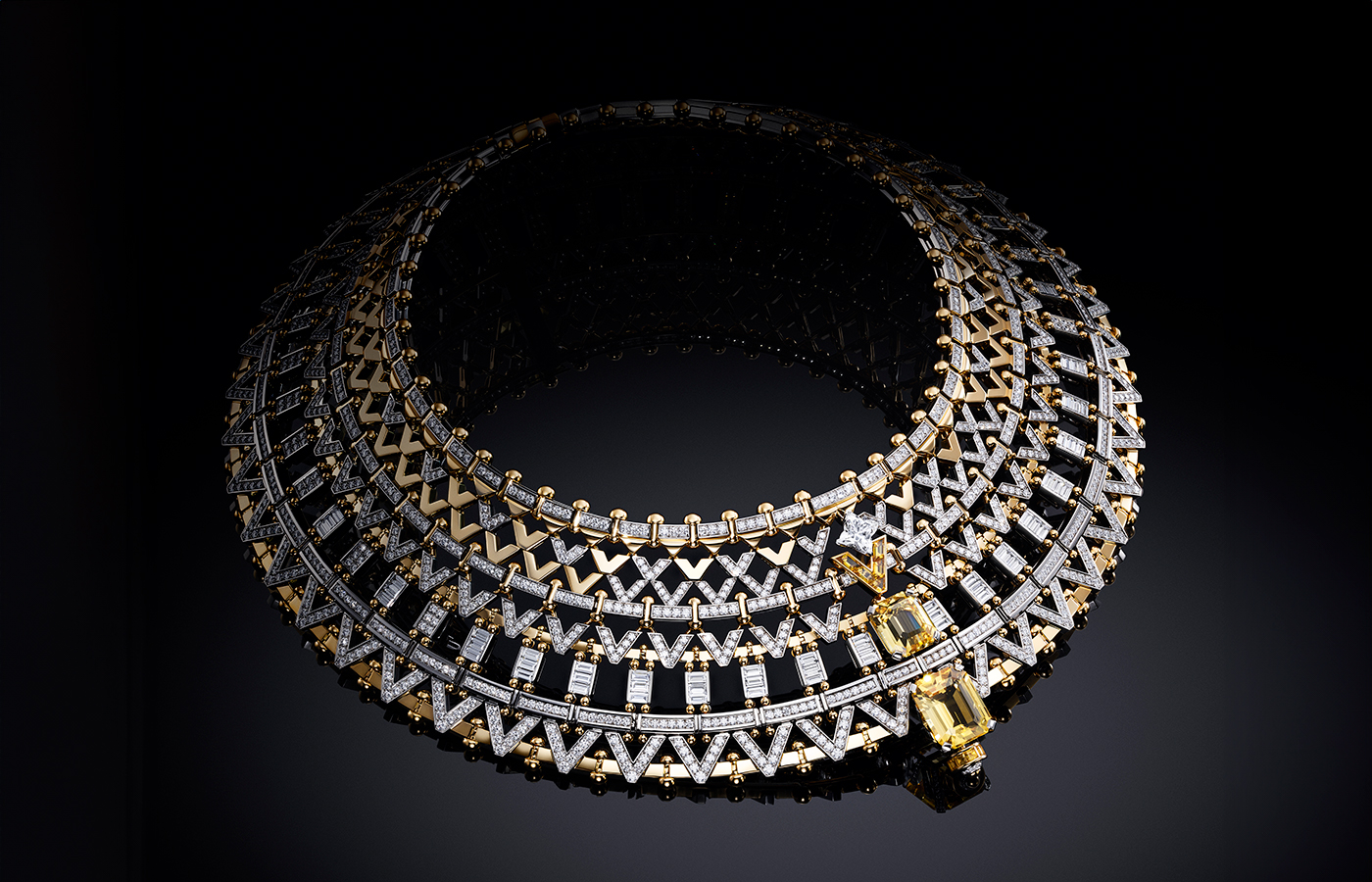 Louis Vuitton Vision necklace with two octogonal step-cut yellow sapphires of 13.47 and 11.79 - carats, one 2.01 - carat LV Monogram Star cut diamond, yellow sapphires and diamonds in platinum and gold from the Awakened Hands, Awakened Minds collection