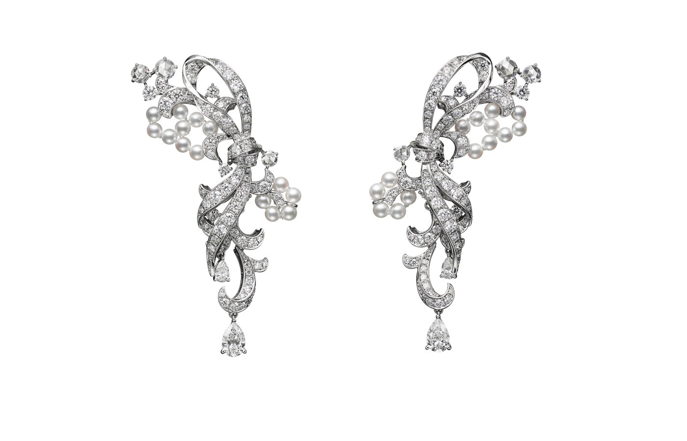  Mikimoto earrings with Akoya cultured pearls, round brilliant-cut diamonds and pear-shaped diamond drops in 18k white gold, from ‘The Bows’ High Jewellery collection