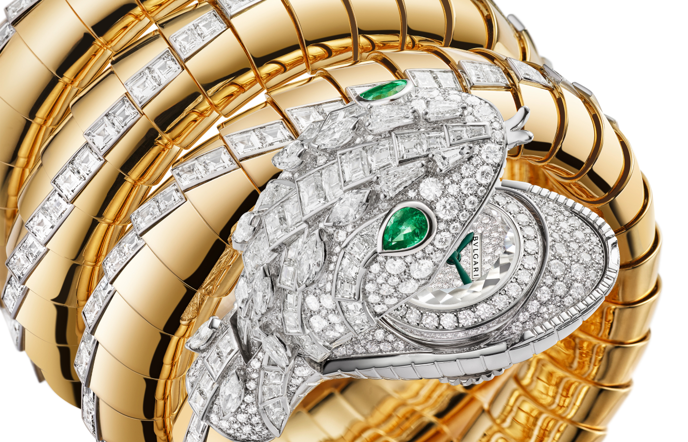  Close-up angle of the Bvlgari Serpenti Misteriosi Dragone secret watch from the Aeterna collection with diamonds and emeralds in 18k white and rose gold
