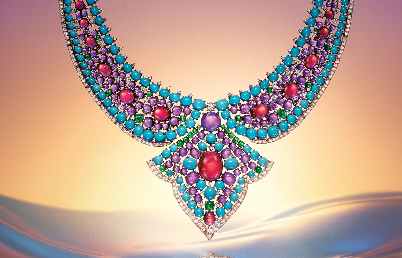 Bvlgari Lotus Cabochon necklace from the Aeterna collection with  rubellite, turqoise, emerald and amethyst cabochons set on a 18k yellow gold base