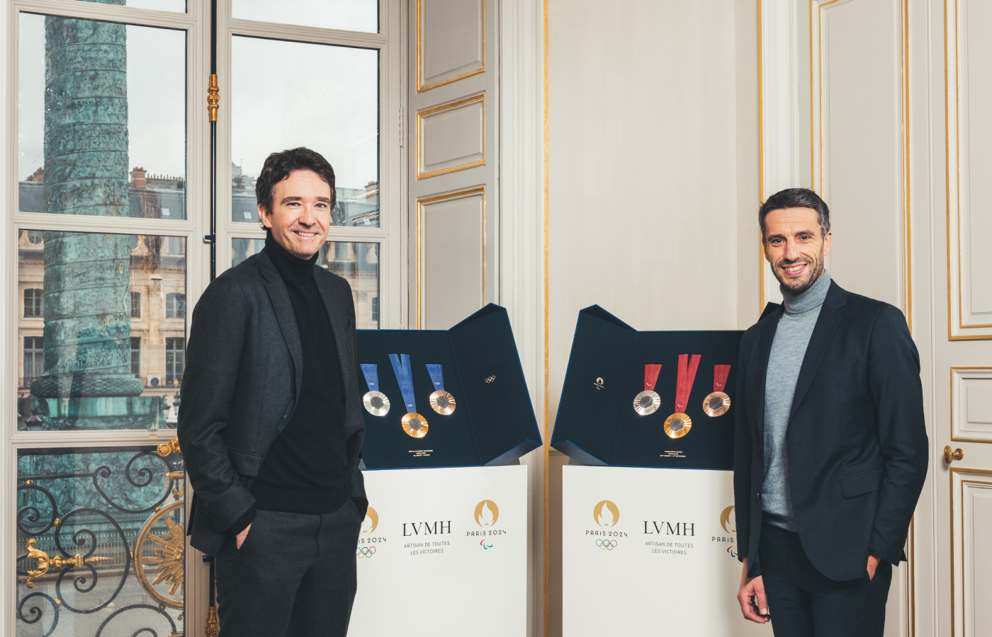 Antoine Arnault and Tony Estanguet with the Olympic and Paralympic medals, designed by Chaumet