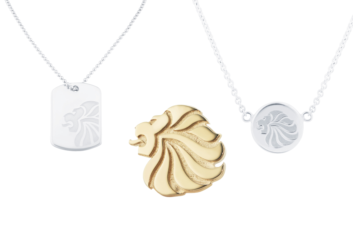  Mappin & Webb x Team GB lion head pendants in sterling silver and a lion head gold plated pin