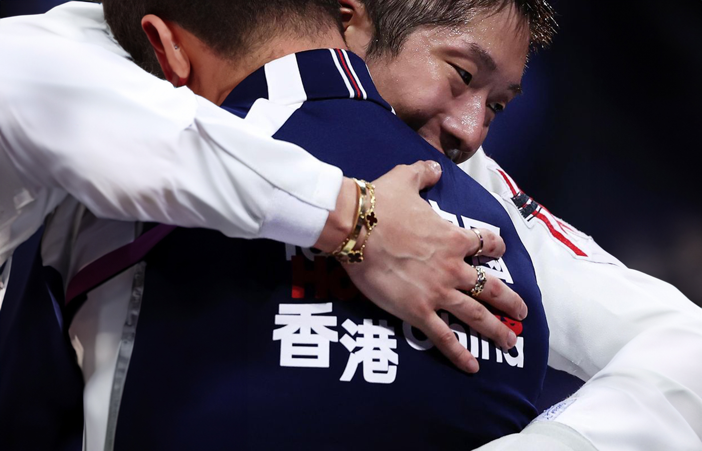  Gold medalist Cheung Ka Long at the Olympic Games Paris 2024 wearing a Van Cleef & Arpels Alhambra bracelet with carnelian in 18k yellow gold and a Cartier Love bangle with diamonds in 18k yellow gold
