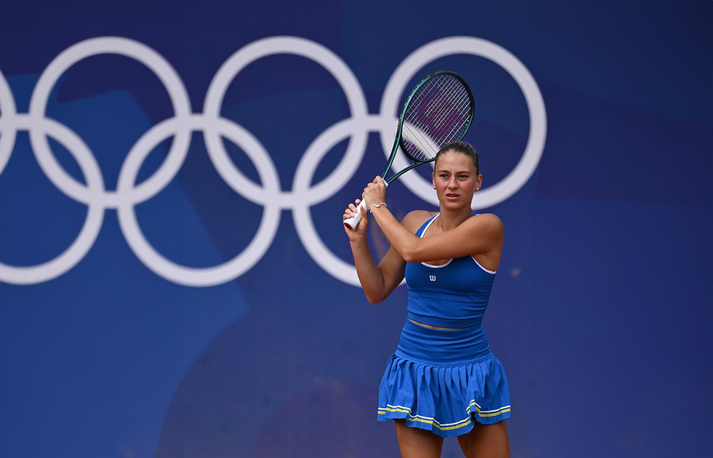  Tennis player Marta Kostyuk at the Paris 2024 Olympics wearing two mother-of-pearl Van Cleef & Arpels Alhambra bracelets 18k white gold