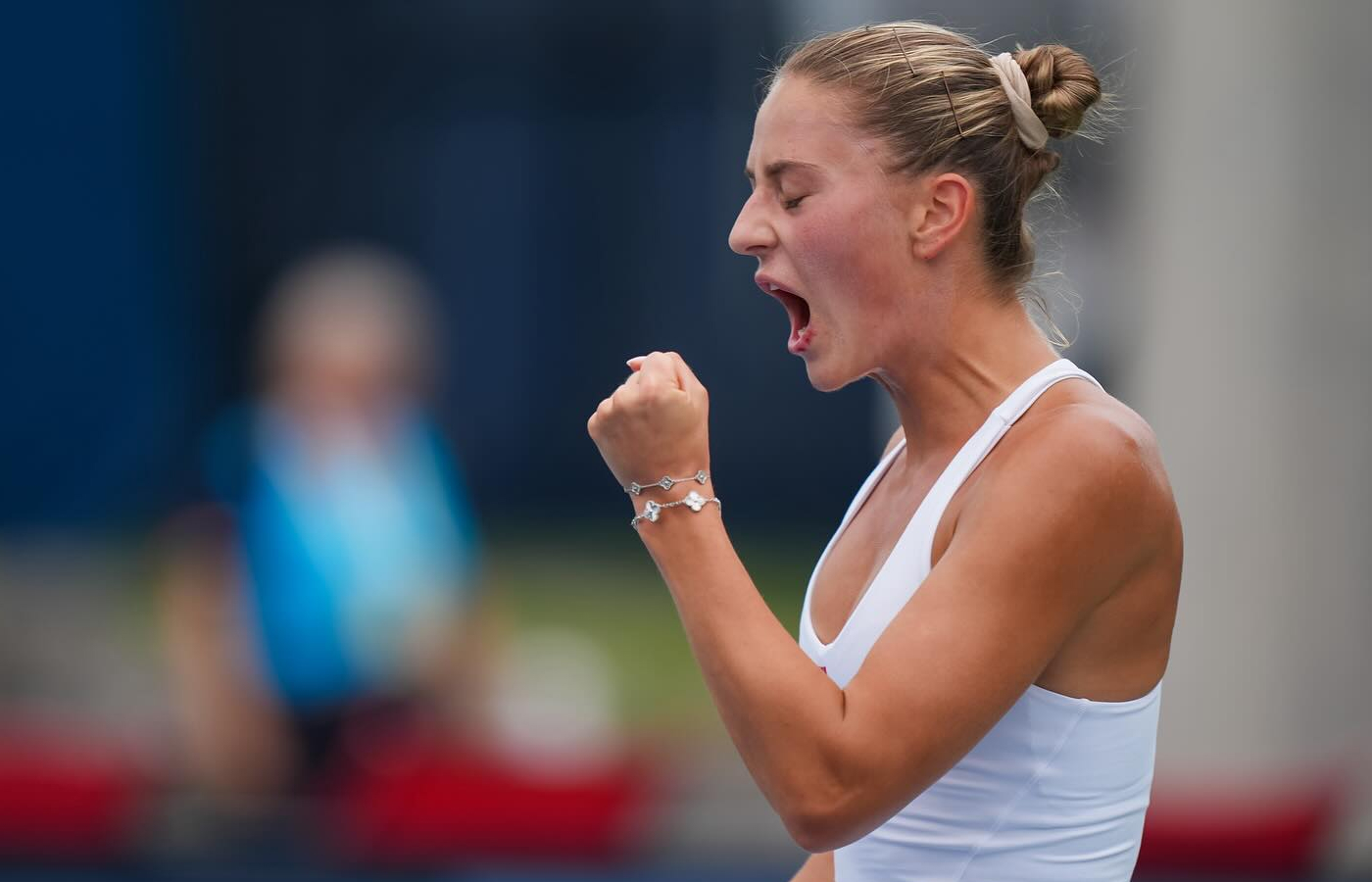 Tennis player Marta Kostyuk at the Paris 2024 Olympics wearing two mother-of-pearl Van Cleef & Arpels Alhambra bracelets 18k white gold