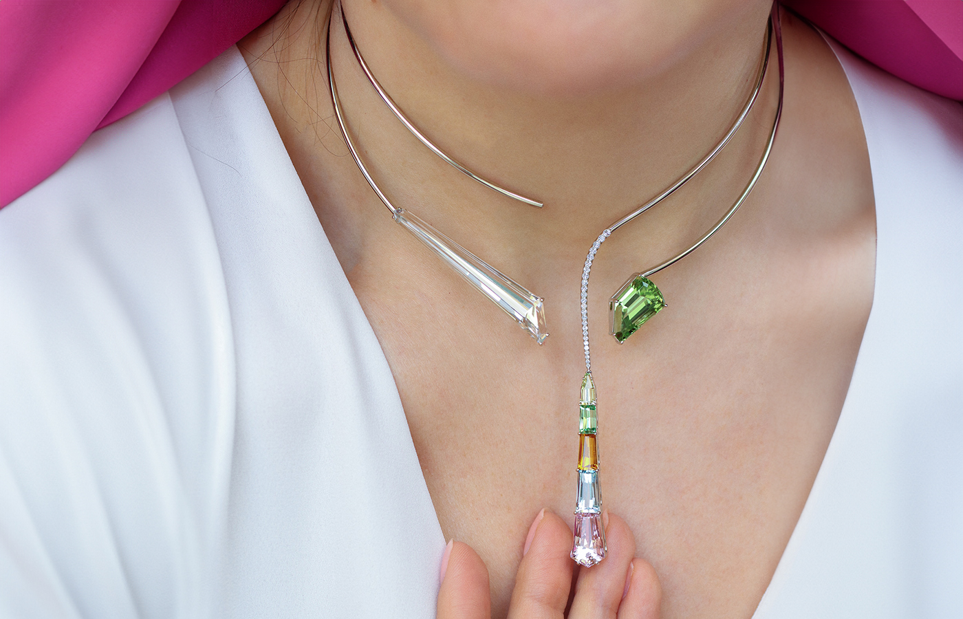 Katerina Perez wears the Robert Guild Confluence necklace with fancy-cut gemstones including an 18.97 carat ‘platinum beryl’ (goshenite) and a 10.75-carat peridot set in 18k white gold  