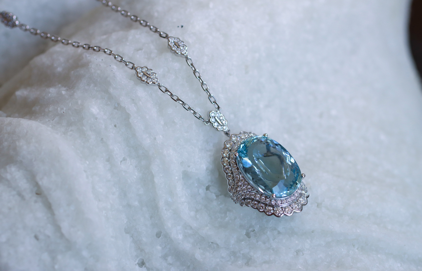 Sunita Nahata Blue Planet necklace with a 22.32 carat oval-shaped aquamarine, round brilliant-cut diamonds and pavé diamonds, set in 18k white gold  