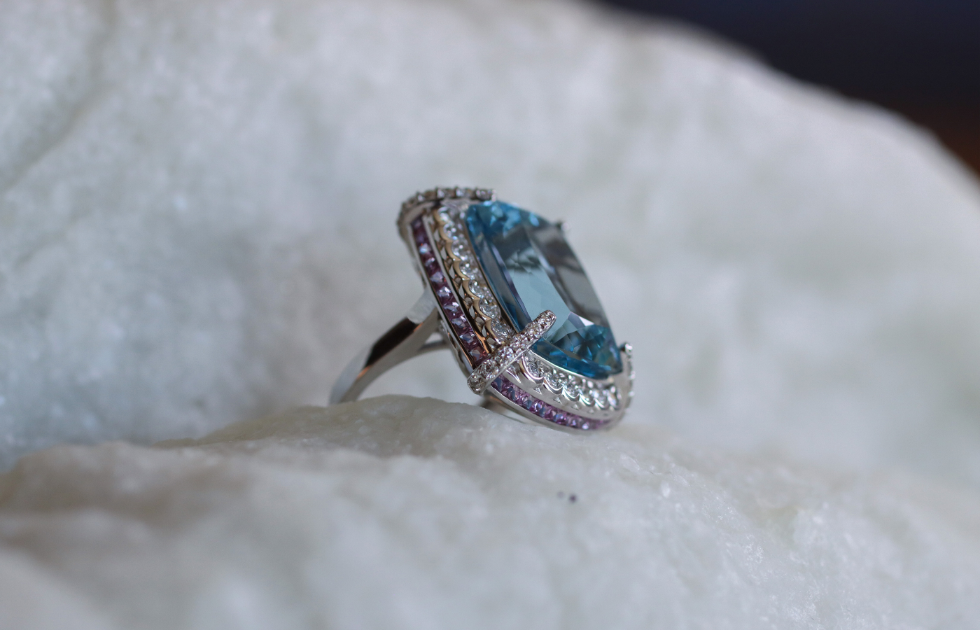  Sunita Nahata Blue Planet ring with a 26.88 carat cushion-cut aquamarine, 2.13 carats of princess-cut pink sapphires, and round brilliant-cut diamonds in 18k white gold    