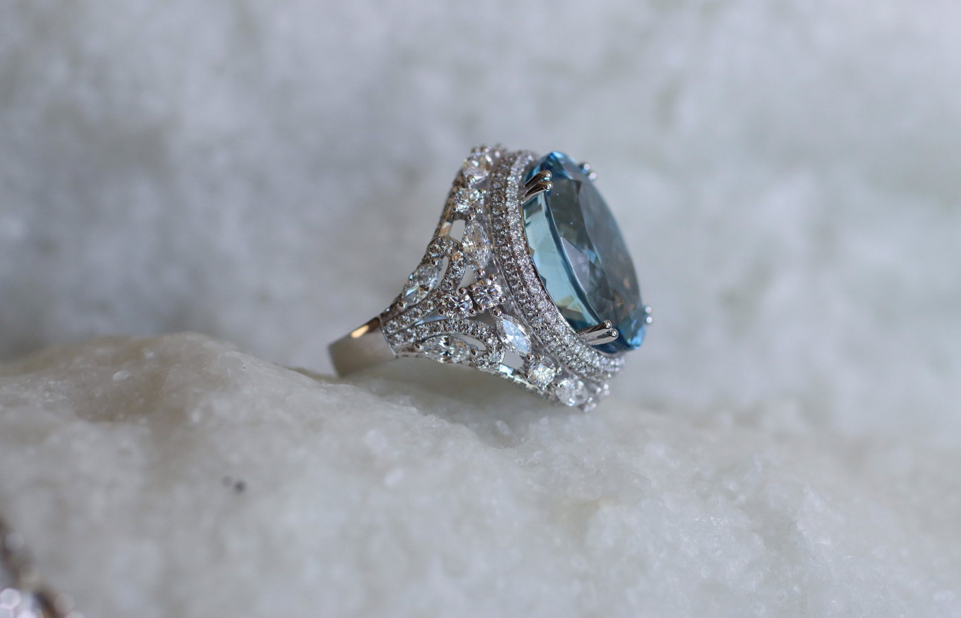  Sunita Nahata Blue Planet ring with an 18.73 carat oval-shaped aquamarine, round brilliant-cut diamonds and marquise-cut diamonds, set in 18k white gold 