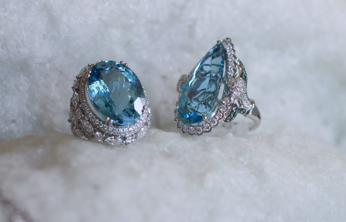  Sunita Nahata Blue Planet collection rings, including an 18.73 carat oval-shaped aquamarine ring with round and marquise diamonds and a pear-shaped aquamarine ring of 17.24 carats with round diamonds, both in 18k white gold   