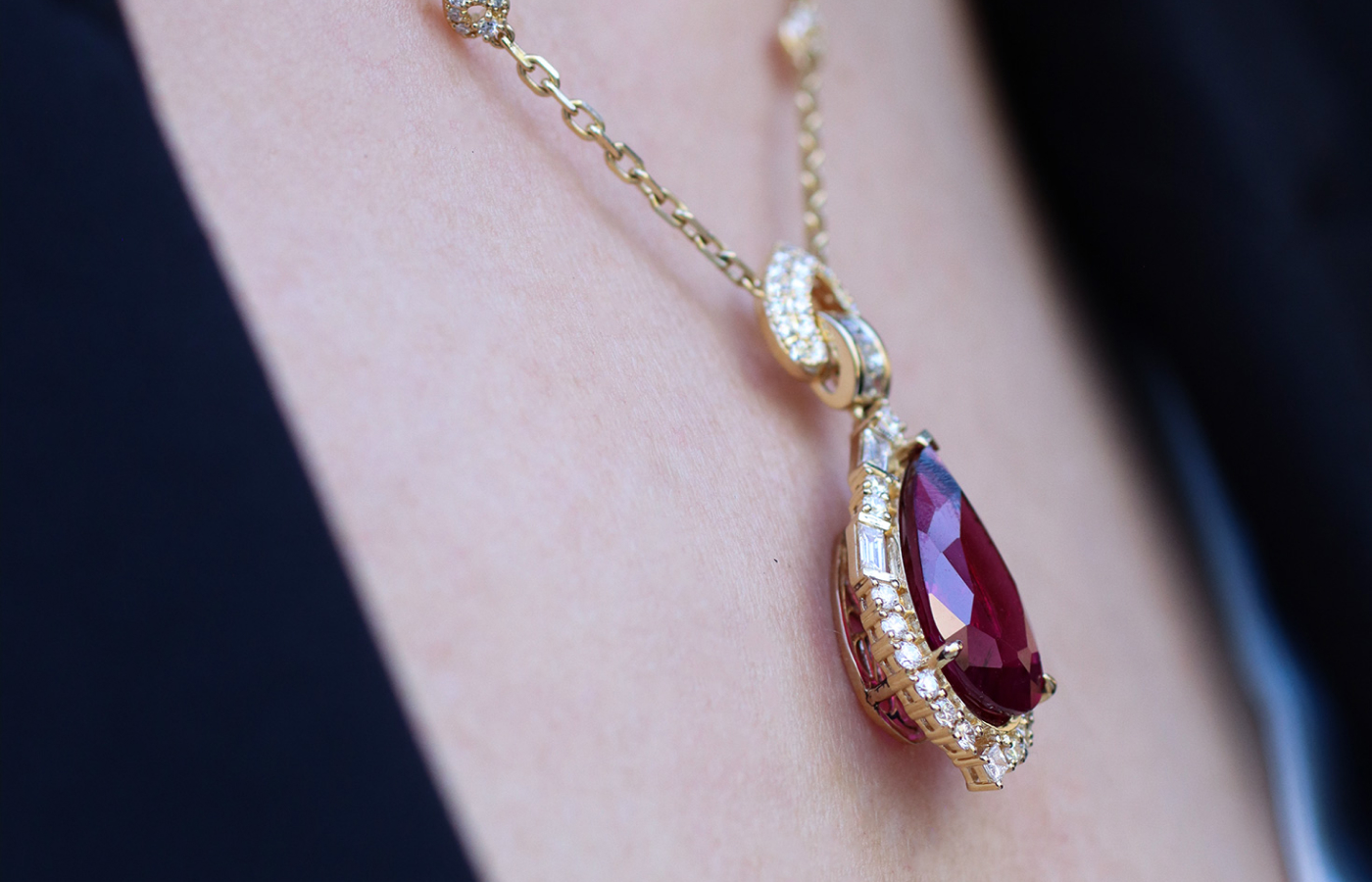  Sunita Nahata Celestial Dragon necklace with a 11.72 carat pear-shaped rubellite, baguette-cut diamonds, and princess- and round brilliant-cut diamonds, set in 18k yellow gold 