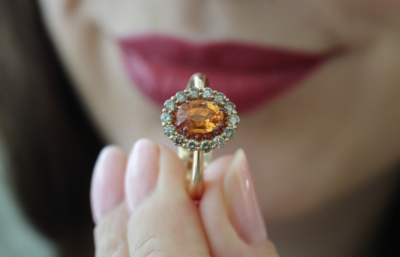  Daverio1933 Essentials collection ring with a 1.17 carat mandarin garnet ring surrounded by orange sapphires and brilliant-cut brown diamonds in 18k rose gold 