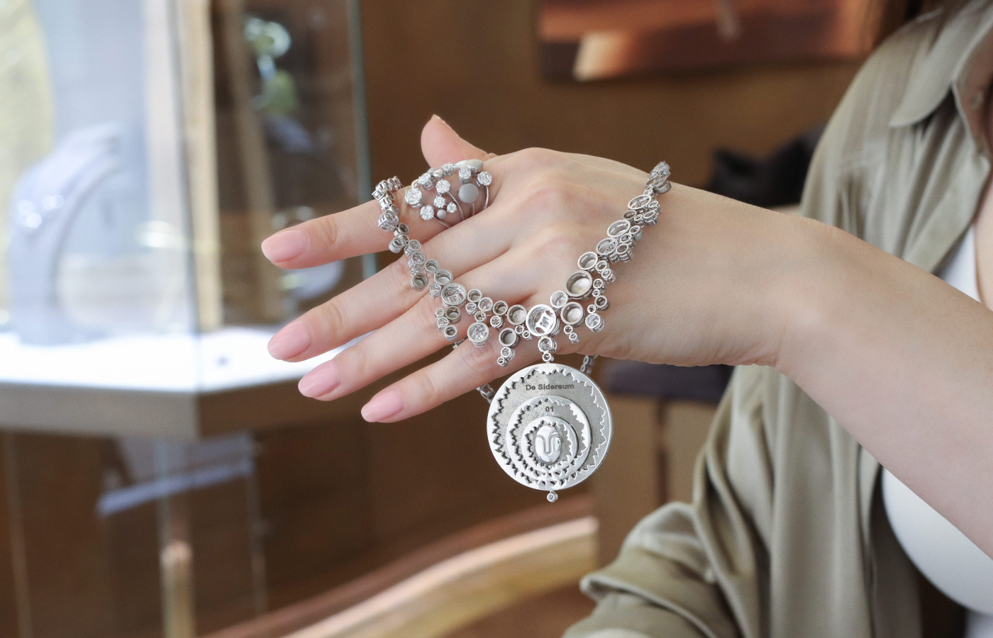  The reverse side of the Daverio1933 Sidereum necklace featuring the brand’s sculpture-inspired logo at the centre of the titanium pendant 