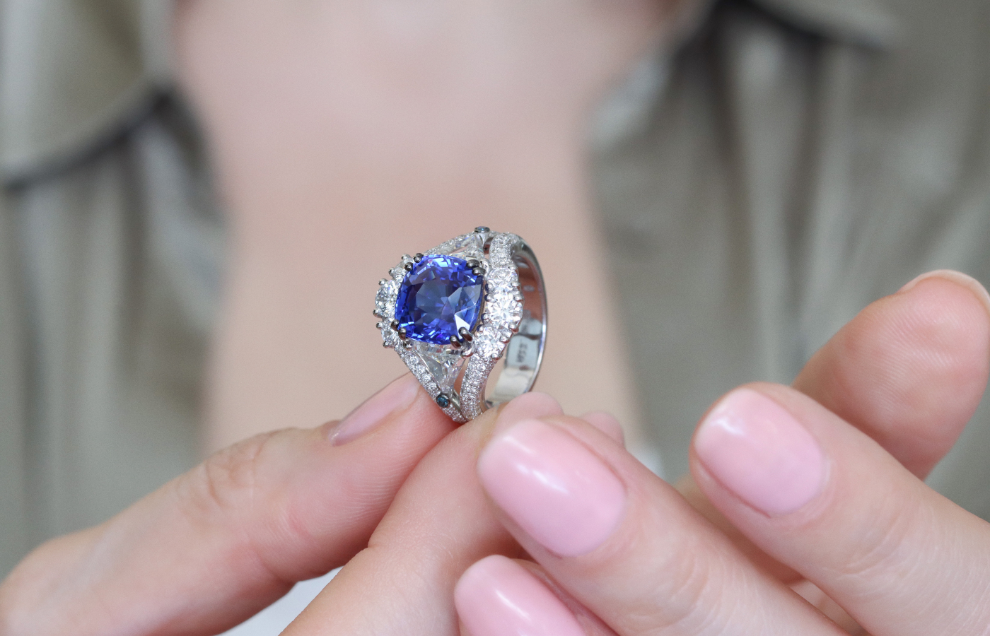   An important cushion-cut Ceylon sapphire ring with D-colour round brilliant-cut diamonds and triangular-shaped diamonds, set in 18k gold by Daverio1933 