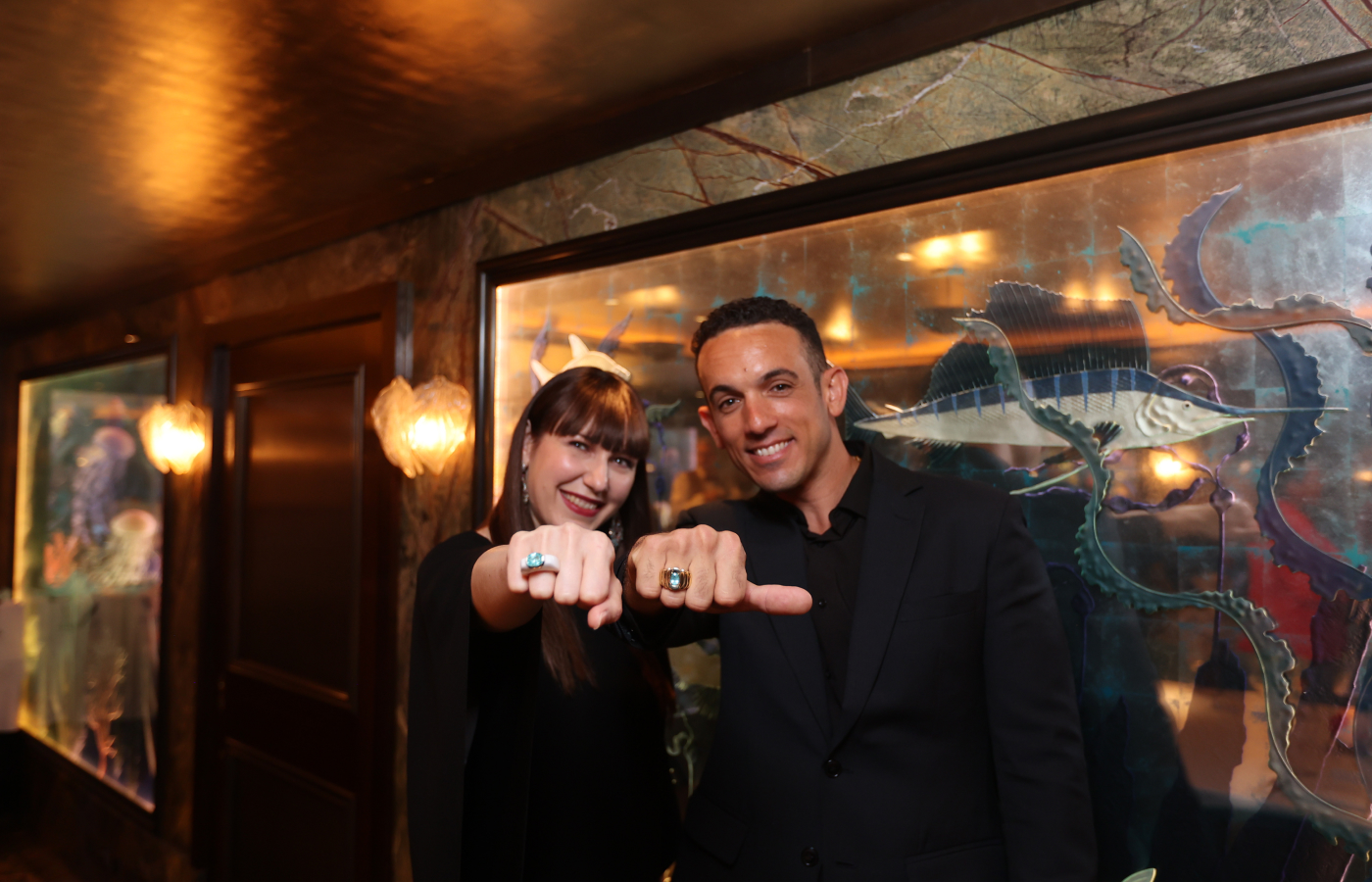 Katerina Perez with with her co-author Kevin Ferreira celebrating in London