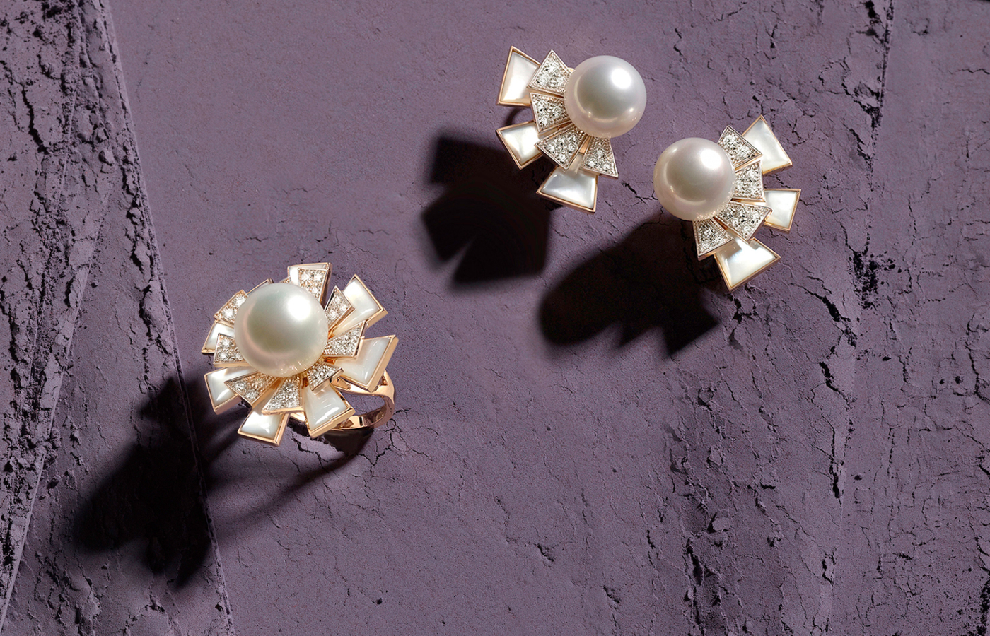 Utopia earrings and ring with mother-of-pearl surrounding a South Sea pearl centrepiece in 18k white gold, from the Flamante collection