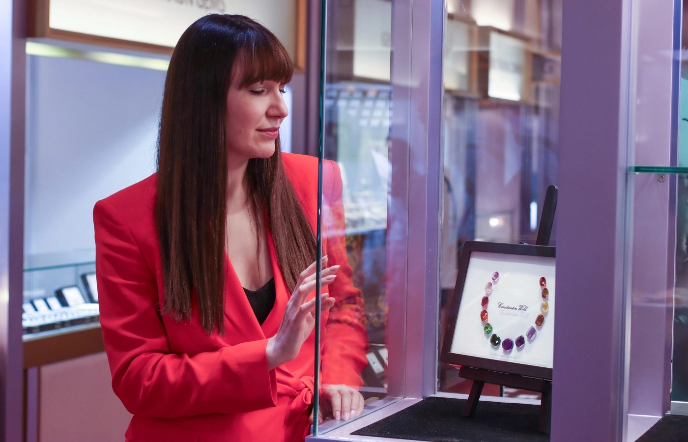 Katerina Perez at a previous edition of Jewellery and Gem World Hong Kong discovering gemstone layouts by Idar-Oberstein-based business, Constantin Wild 