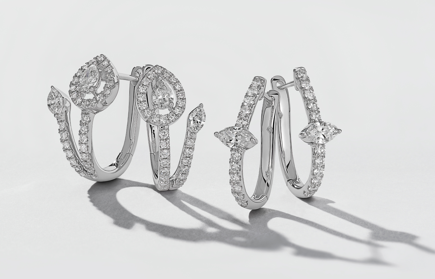  Hassanzadeh Jewellery Pure Grace earrings (left) with pear, round and marquise-cut diamonds and the Fluid Diamonds earrings with marquise and round-cut diamonds