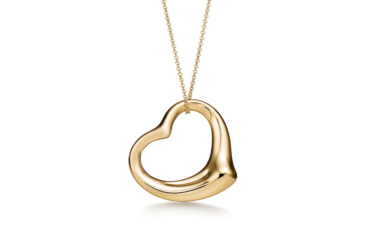  Tiffany & Co. Elsa Peretti Open Heart pendant in 18k yellow gold with a chain