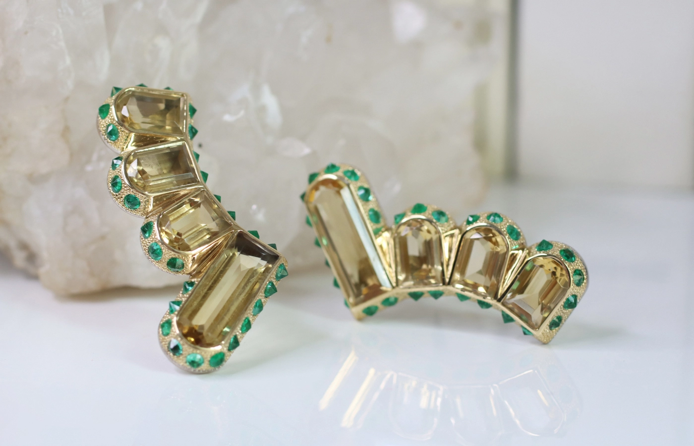  Hugo Cahill Hyperborea earrings from the Renaissance High Jewellery collection with citrines and 60 reverse-set emeralds in 18k palladium gold and 18k gold with a granular finish