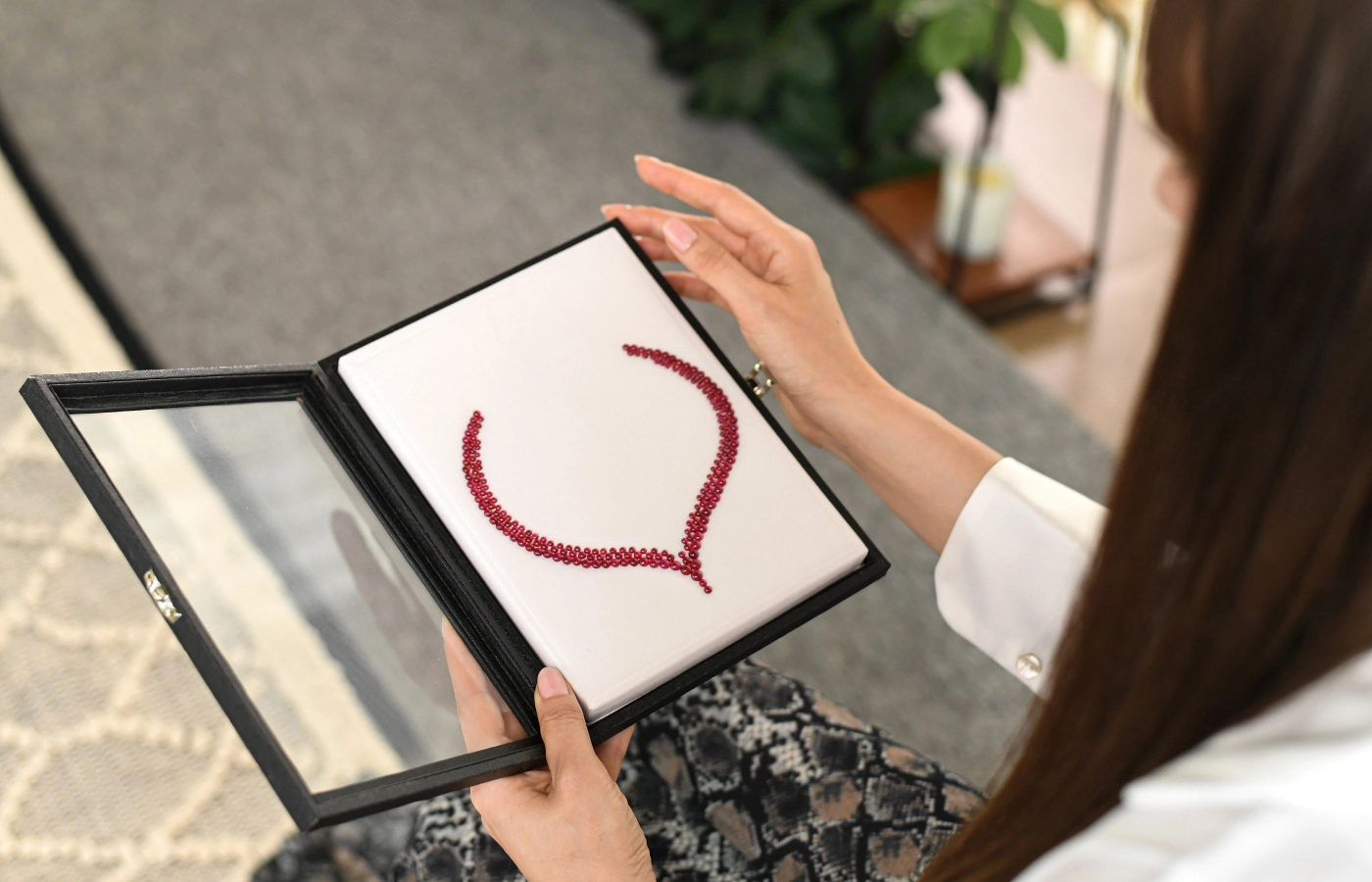 Cabochon rubies perfectly matched by colour and carat weight to form a necklace layout