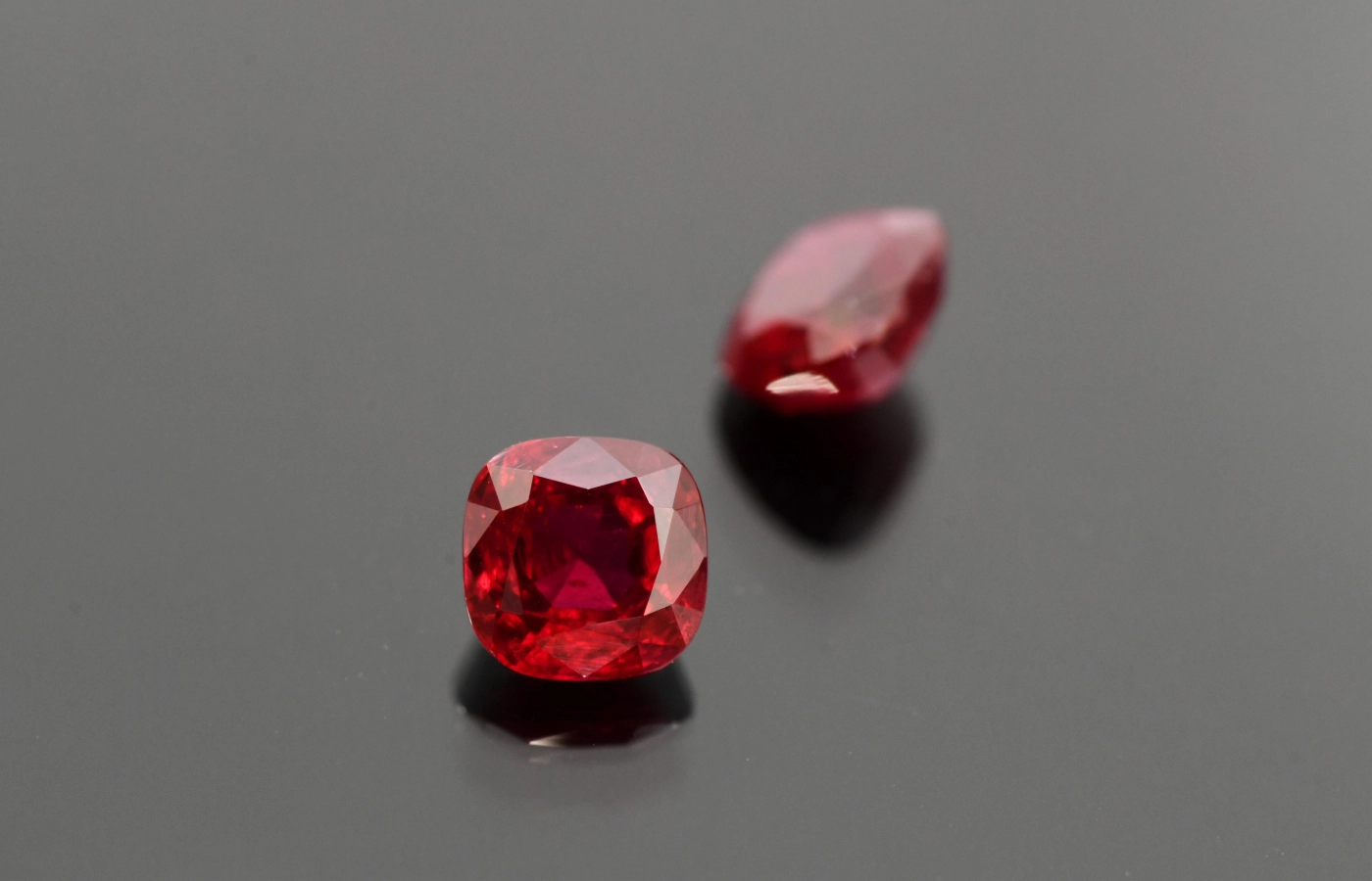  Cushion cut vivid red unheated ruby pair weighing over 4 carats
