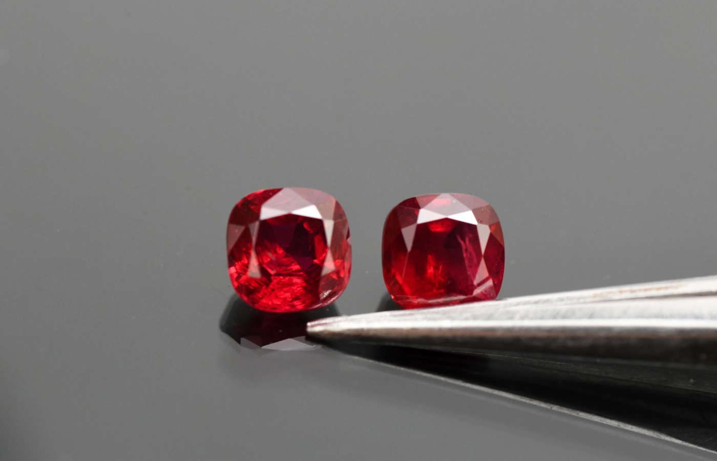  Cushion cut vivid red unheated ruby pair weighing over 4 carats