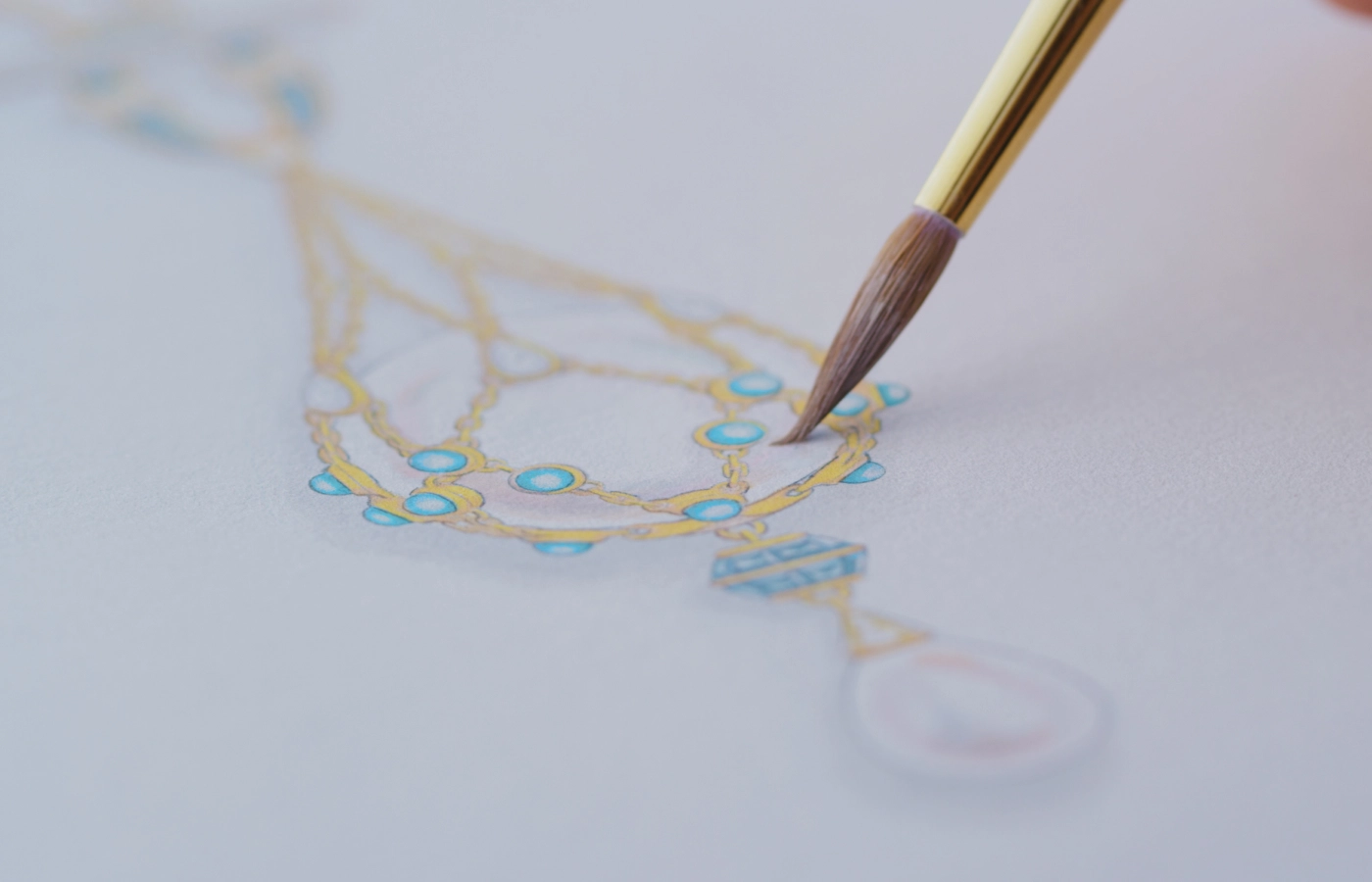  Finer details in the new Paspaley Turquoise Anchored Lavalier pearl necklace include cabochon turquoises, sapphires, pear-shaped moonstones and diamonds, set in 18k yellow gold 